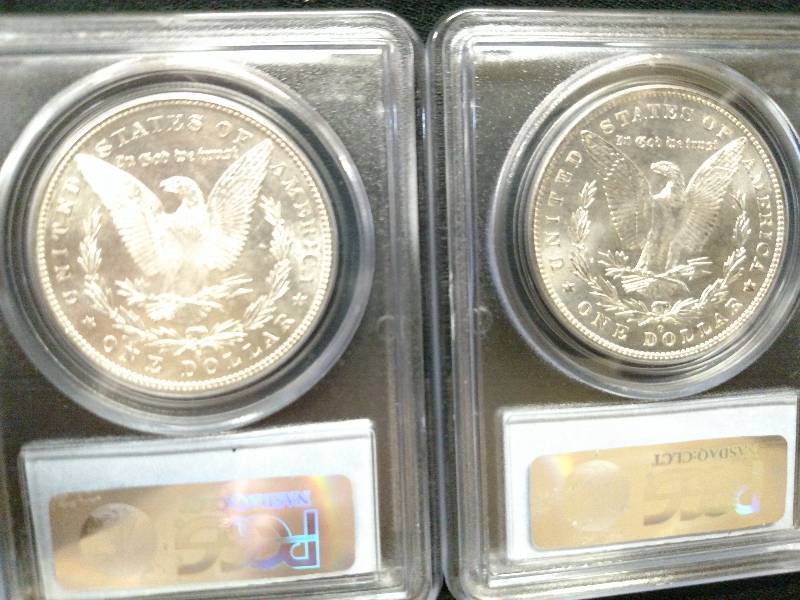 1880 S & 1883 O PCGS MS63 Morgan Si...