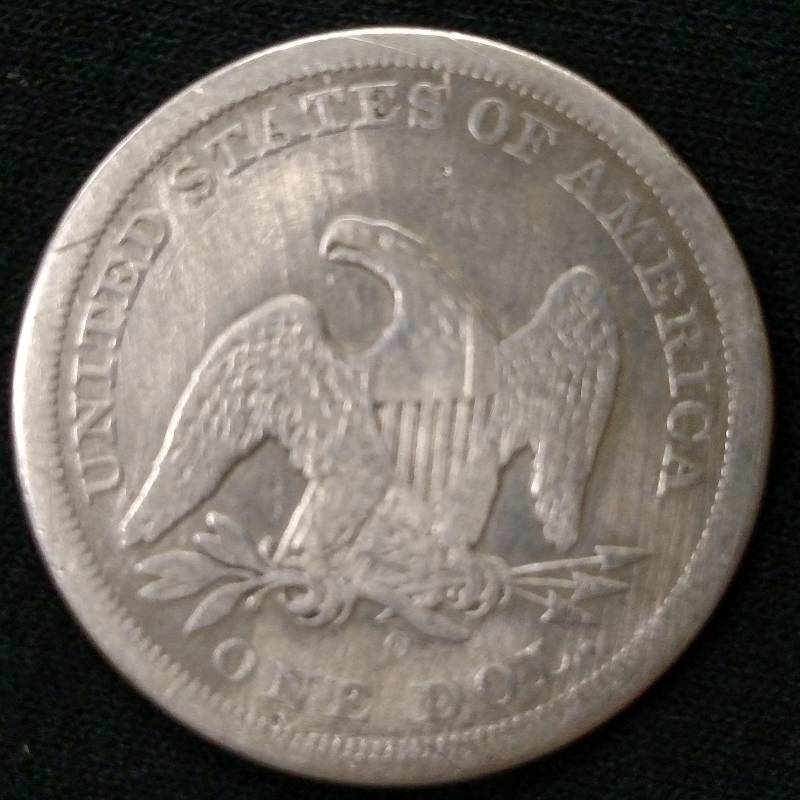 1860 O Seated Liberty Silver Dollar...