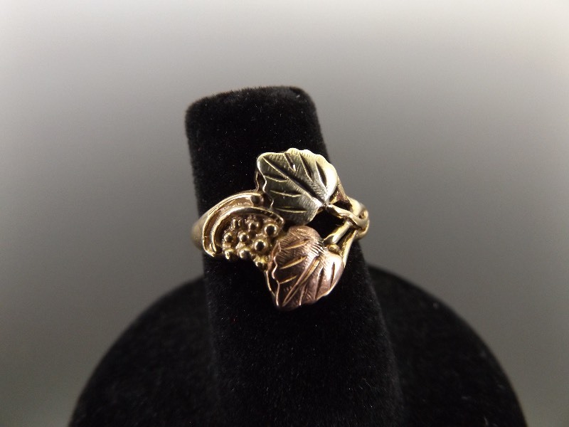 lot 14 image: 12k and 10k Yellow Gold andBlack Hills Ring Size 4.75