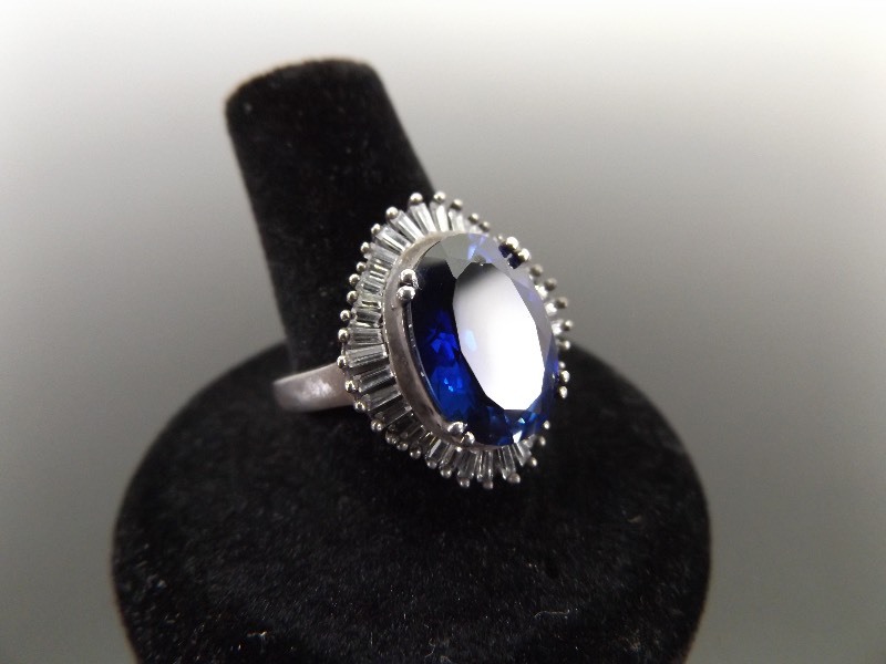 lot 26 image: .925 Sterling Silver Blue Topaz and Crystal Ring Size 8