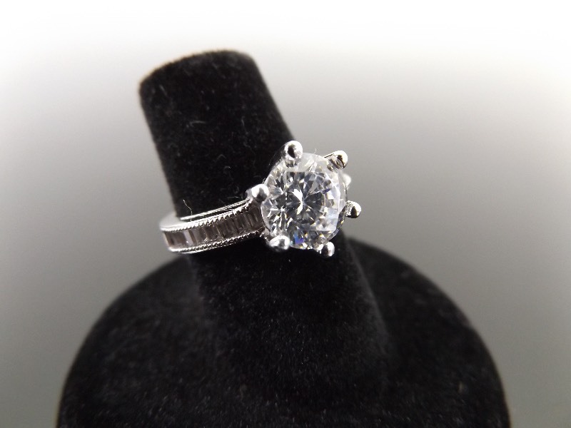 lot 29 image: .925 Sterling Silver Crystal CZ Engagement Ring Size 5.25