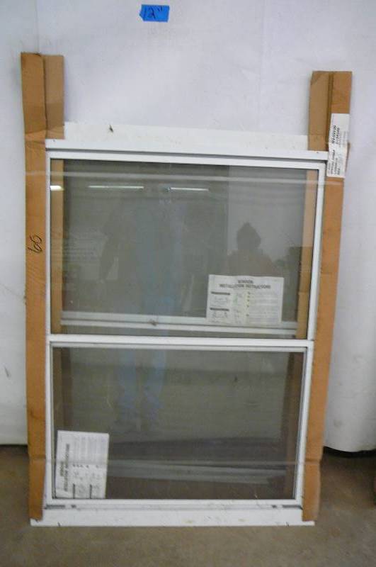 lot 60 image: 4 Larson Storm Window NEW