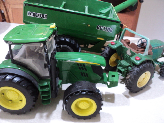 2 toy tractors and a Frontier wagon...