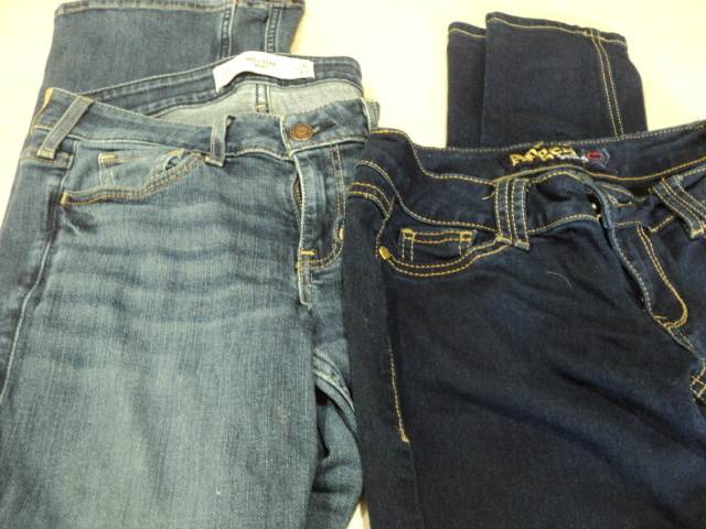 2 pairs of size 3 jeans...