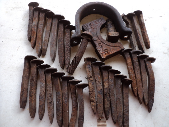 railroad spikes  and cast iron misc...