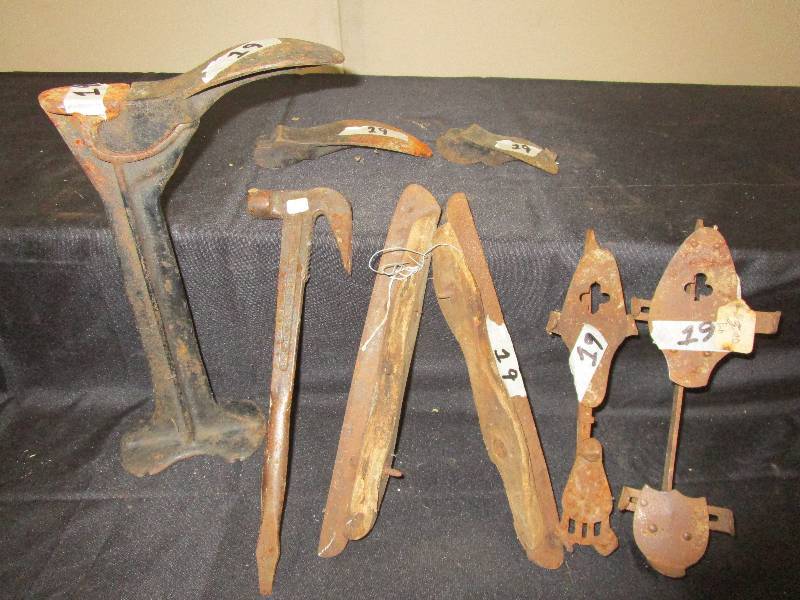 Old skates, antique shoe horn. Old wrench Minnepolis MN