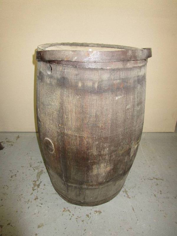 Antique wooden barrel, 13.5 diameter on the top (not thickest part) and 23 tall