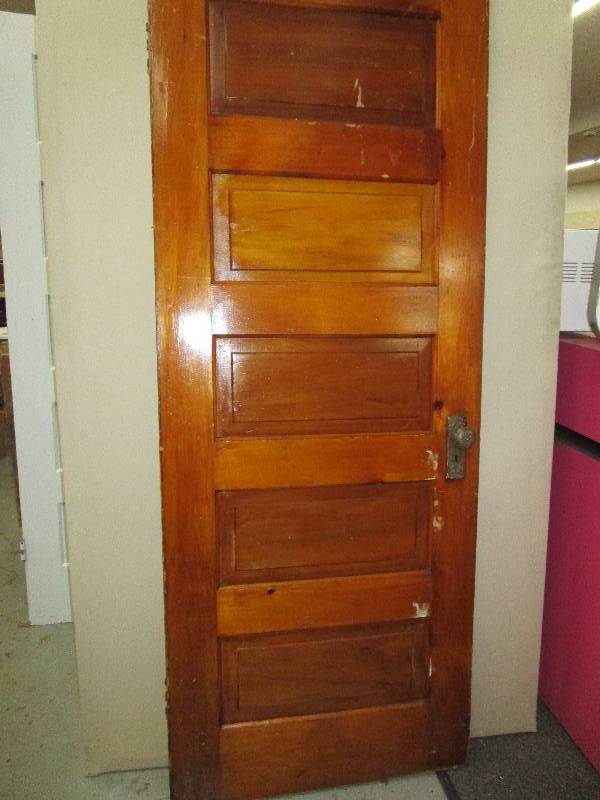 30X77Two sided wooden door, one side is painted  green other side is wooden