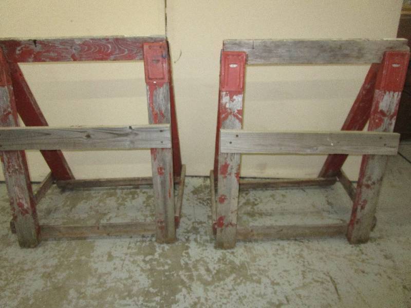 2 wooden saw horses