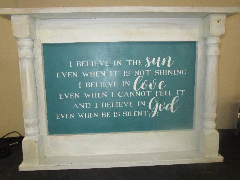 A hanging dcor sign 34X23.5