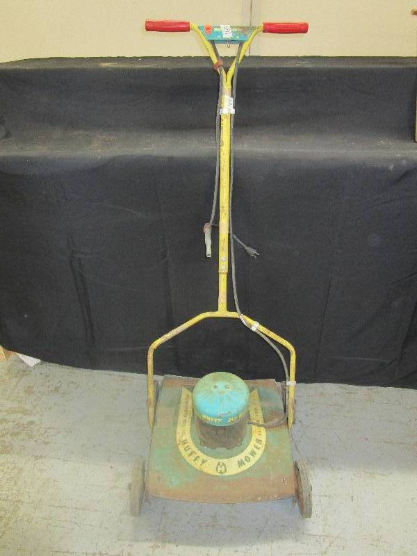 Old Huffy Mower Just for Decoration