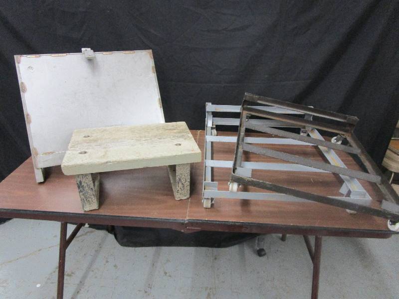 Nice Appliance Carts, Stoiil with Metal Legs and some sort of shelf for traveling