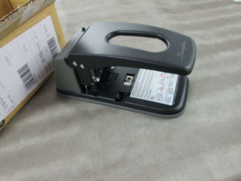 Swingline 2 Hole Punch open box. Un...