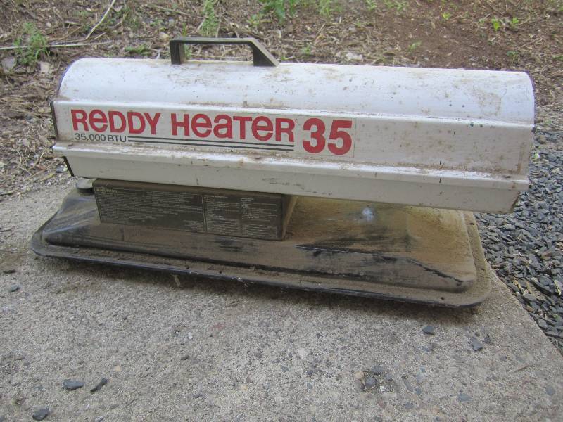 lot 23 image: 35,000 BTU Reddy Heater 35 Fired up...