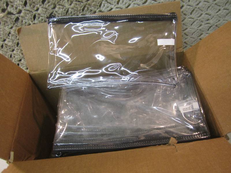 lot 197 image: Case of 50 Clear Vinyl Zipper Walle...