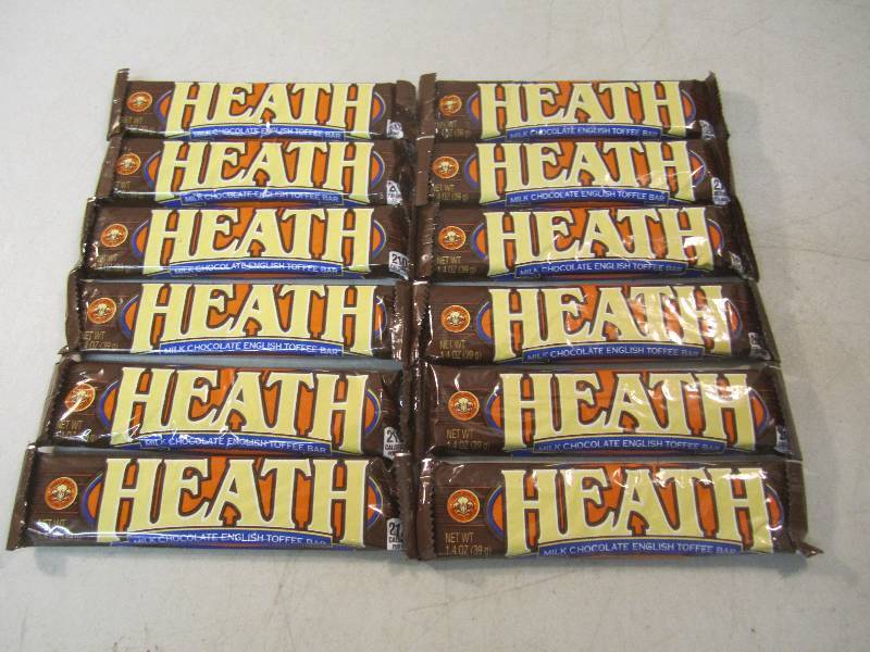 lot 243 image: 12 Heath Candy Bars Best by Jan 201...