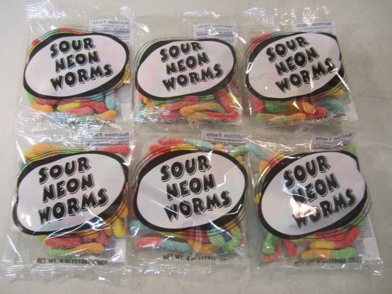 lot 262 image: 6 Bags of Sour Neon Worms Best by F...