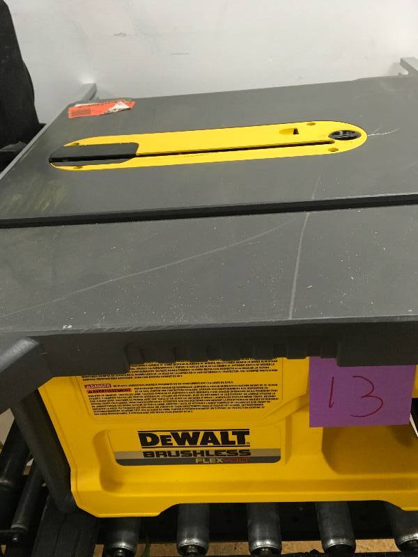 lot 13 image: DEWALT FLEXVOLT 60-Volt MAX Lithium-Ion Cordless Brushless 8-14 in. Table Saw in working conditions Tool OnlY