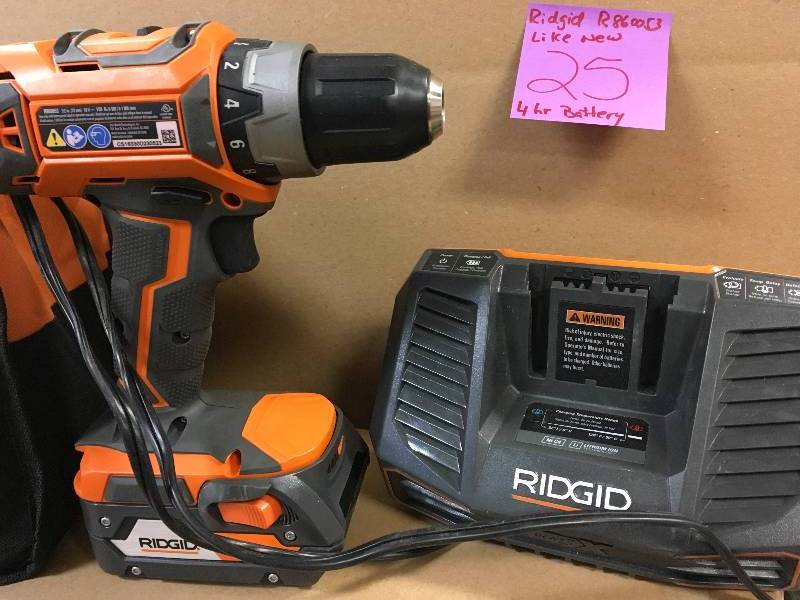 lot 25 image: RIDGID 18-Volt Lithium-Ion Cordless 12 in. Compact DrillDriver Kit with (2) 1.5Ah Batteries Charger and Bag Used like new condition