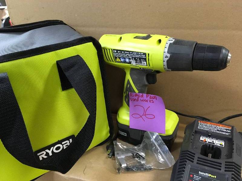 lot 26 image: RYOBI 18 Volt ONE Lithium Ion Cordless DrillDriver Kit with 1.3 Ah Battery and Charger Used in good working cond.