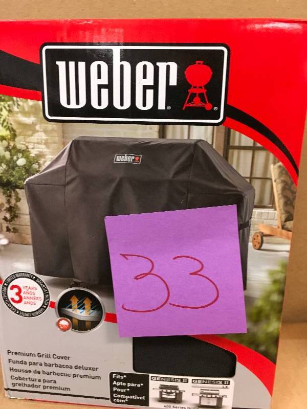 lot 33 image: Weber Genesis II 4 Burner Premium Gas Grill Cover in good conditions