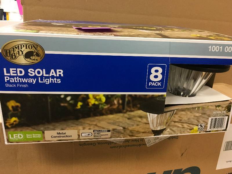 lot 37 image: Hampton Bay Solar Black Outdoor Integrated LED Landscape Path Light with Ribbed Pattern Glass Lens (8-Pack) not used