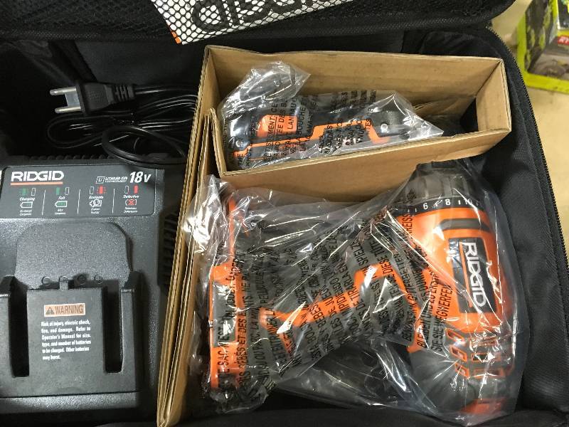lot 44 image: RIDGID 18-Volt Cordless Lithium-Ion 12 in. Compact DrillDriver Kit with (1) 1.5Ah Battery and Charger in good conditions