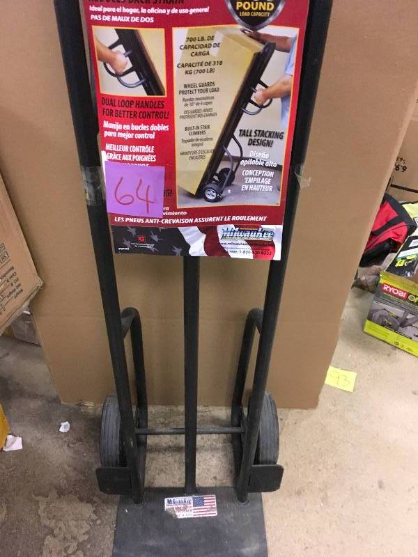lot 64 image: MILWAUKEE 700 lb. Capacity Dual-Handle Hand Truck in good conditions