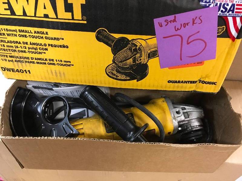 lot 75 image: DEWALT 7 Amp 4-12 in. Small Angle Grinder with 1-Touch Guard Used in good working condition