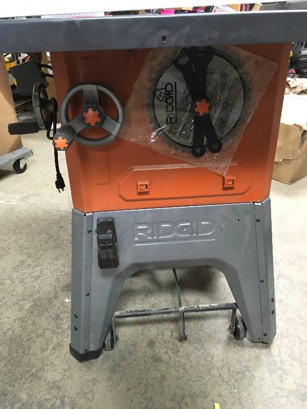Ridgid 13 Amp 10 in. Professional Cast Iron Table Saw in working condition