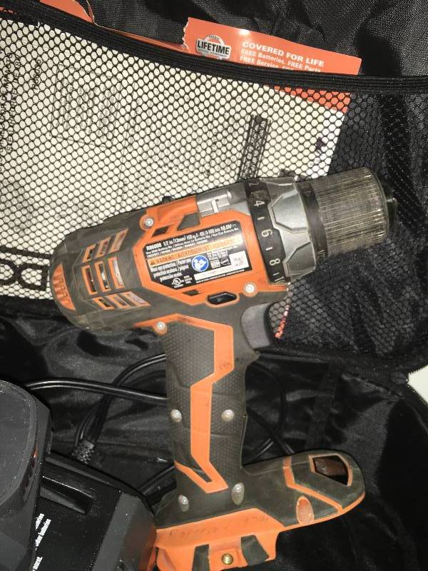 Ridgid 18-Volt Lithium-Ion 12 in. Cordless Compact Drill Kit in working condition