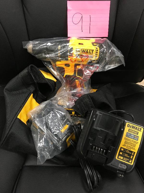 Dewalt 20-Volt MAX Lithium-Ion Cordless Brushless Compact Drill Driver with (1) Battery 1.3Ah, Charger and Bag in working conditions