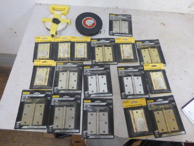 lot 31 image: 2 Tape Measures and 3 12 Hinges