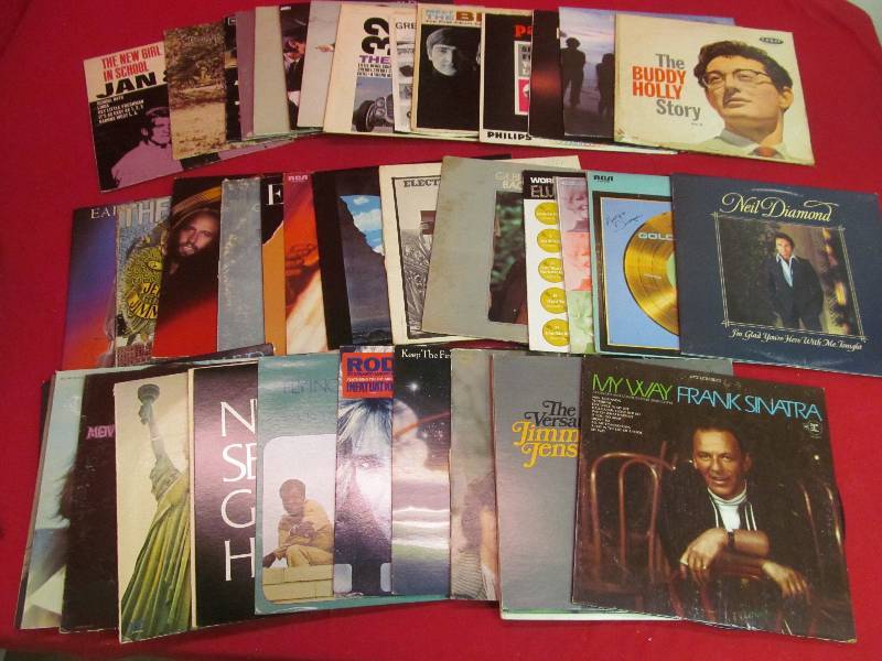 lot 97 image: Group of 40 Vintage Vinyl Albums - Buddy Holly, Joe Cocker, Led Zeppelin, Beatles, WHO, Elvis, and many more