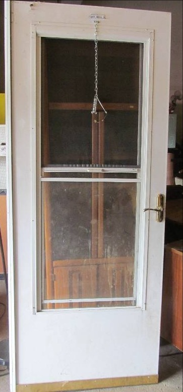 lot 116 image: Storm Door with Sliding Screen Window and Frame - 32 Wide