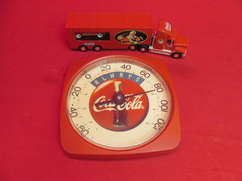 lot 147 image: Coca cola Thermometer, semi with corvette