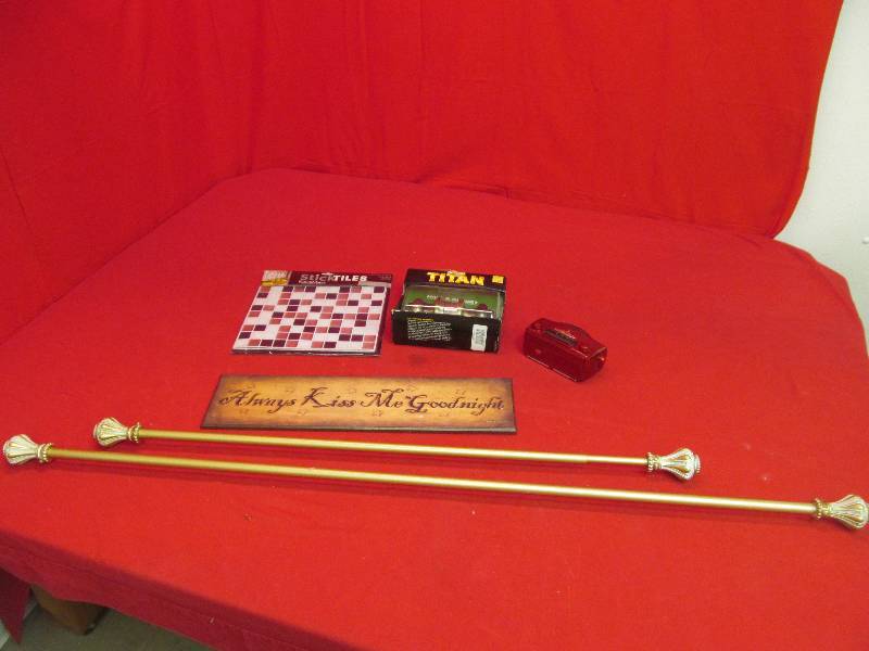 lot 149 image: curtain rods, wall dcor. Radio knob