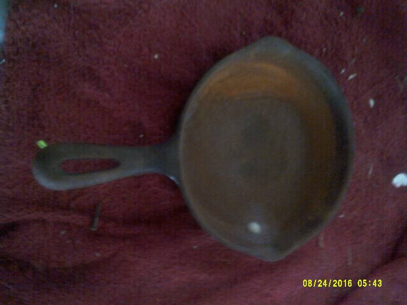 lot 1 image: ANTIQUE CAST IRON PAN