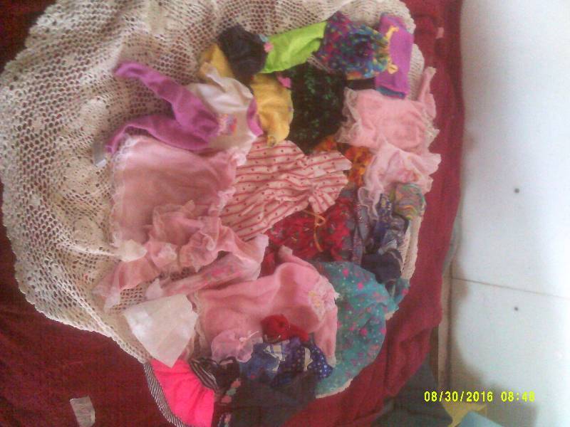 lot 59 image: LOTS OF BARBIE DOLL CLOTHS