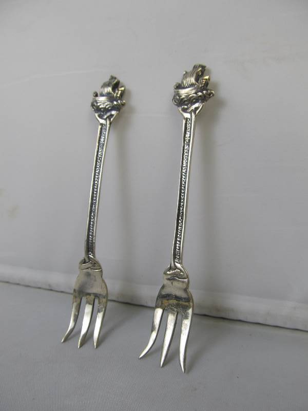 lot 71 image: Antique Signed Joseph Cook & Sons Sterling Silver Cocktail Forks