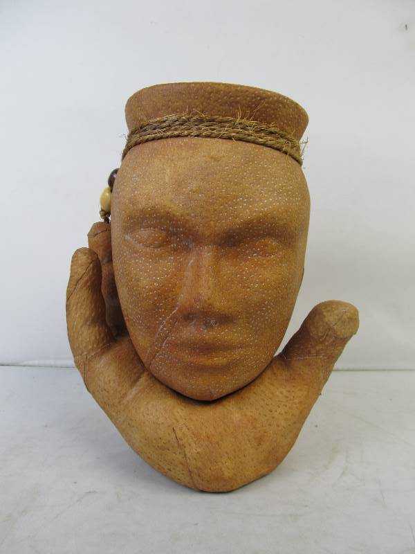 lot 76 image: Vintage Leather-Wrapped Terra Cotta Head on Hand Pottery Vase