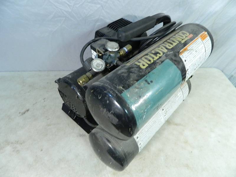 lot 65 image: Coleman Air Compressor