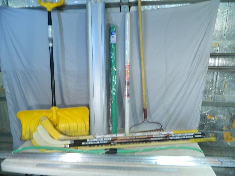 lot 86 image: Hockey Sticks, Long Handle Tools, Bow, Etc