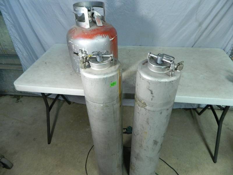 lot 89 image: Stainless Tanks and 20 lb Propane Tank