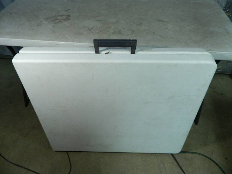 lot 91 image: 6 ft Folding Poly Table