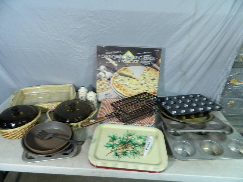 lot 104 image: New Pizza Stone, Pyrex, Trays, and More