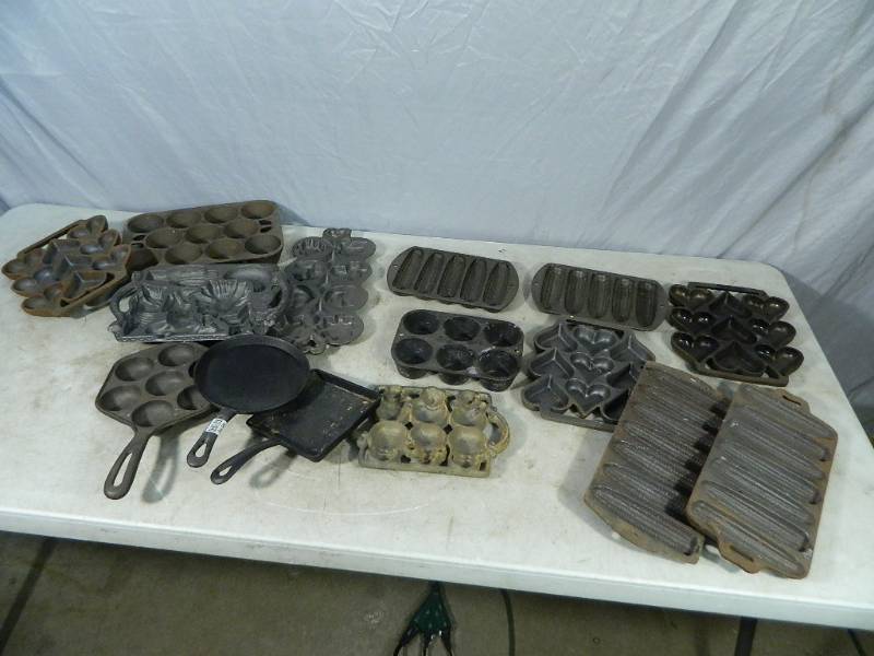 lot 135 image: Heavy Cast Iron Molds
