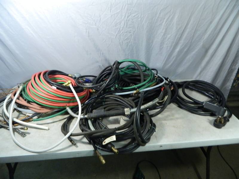 lot 142 image: Heavy Power Cords, Welding Cords, Torch Hoses, Etc