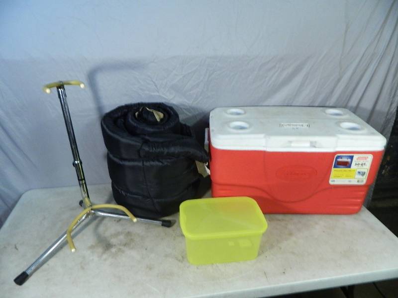 lot 161 image: 50 Qt Cooler, Sleeping Bag, Guitar Stand