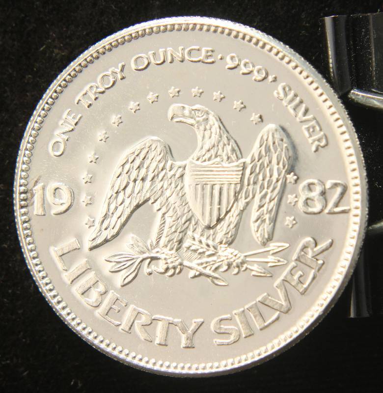 1 TROY OZ. .999 FINE SILVER 1982 A-MARK LIBERTY ROUND